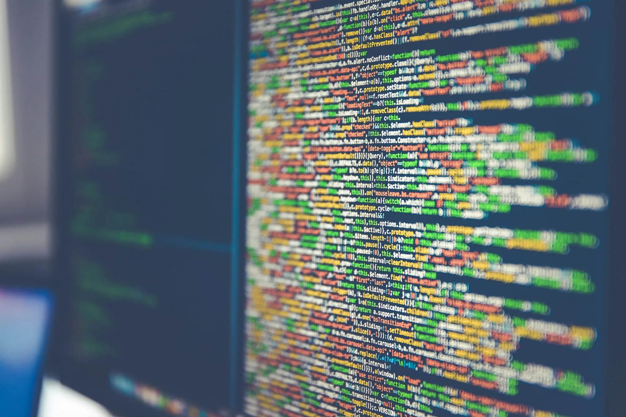 Lines of colourful code on a computer monitor